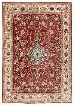 A carpet, Tabriz old, signed, approximately 294 x 208 cm.