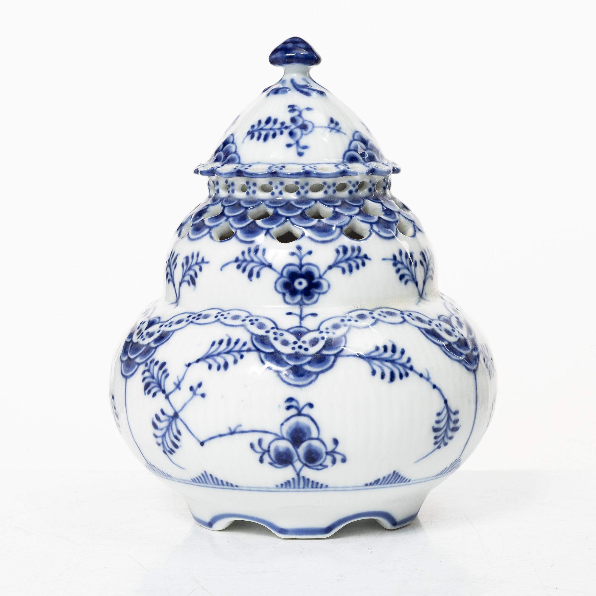 Royal Copenhagen, A 'Blue Fluted' full lace porcelain potpurri urn with cover, model 1/1186, Denmark, 1889-1922.