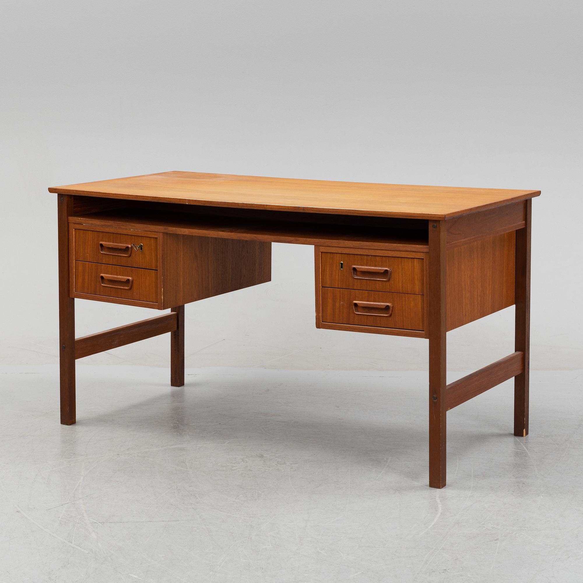 A 1960's teak writing desk.