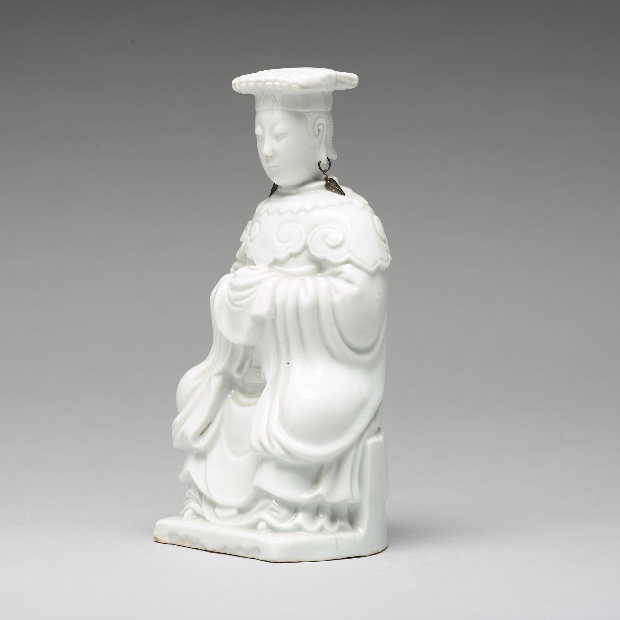 A blanc de chine figure of a deity, Qing dynasty, 19th Century.