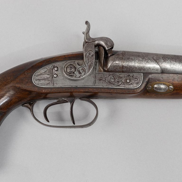 A double-barrelled percussion pistol, second half of the 19th century.