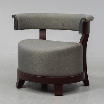 A contemporary 'Chelsea' armchair by Romeo Sozzi for Promemoria Furniture.