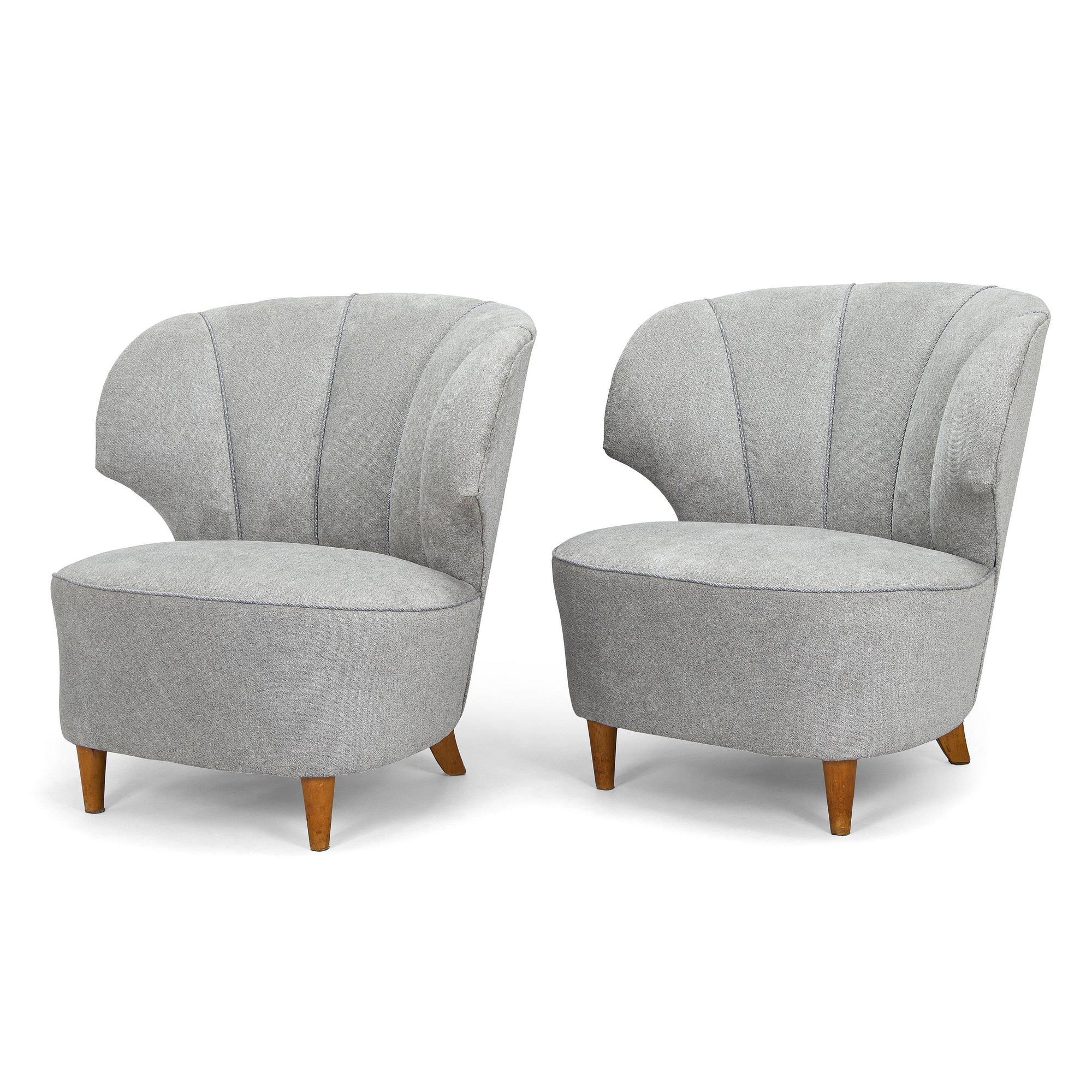 A pair of mid 20th century armchairs.
