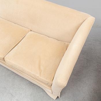 An end of the 20th Century sofa with cordory upholstery.