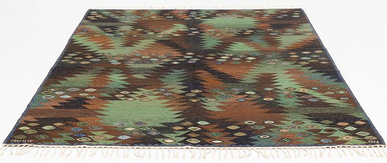 Barbro Nilsson, a carpet, flat weave, "Tånga brun och grön", ca 273 x 211 cm, signed AB MMF BN.