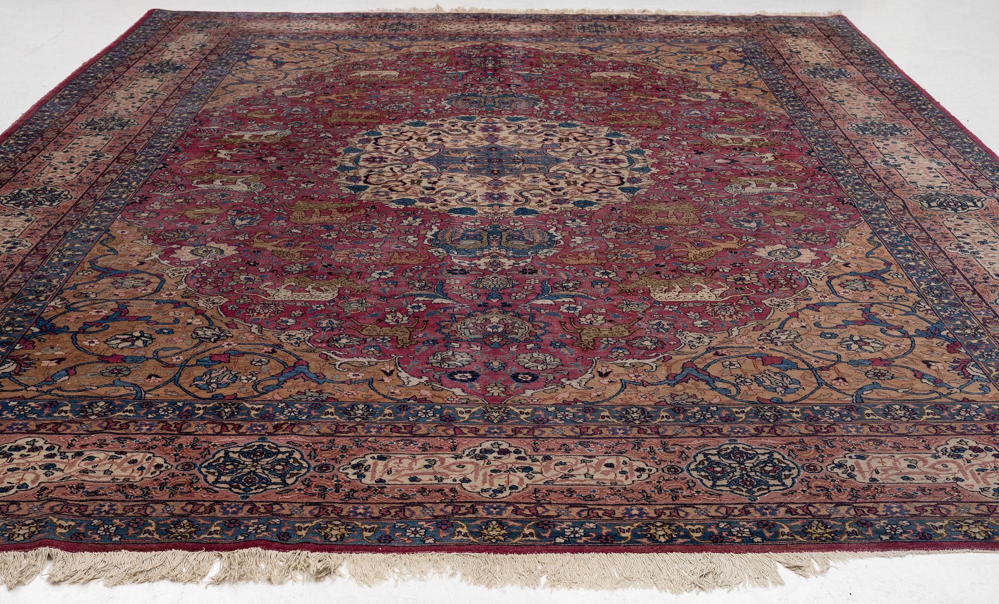 An antique Tabriz carpet, West Persia, c. 447 x 322 cm.