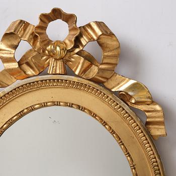 A pair of late Gustavian giltwood one light girandoles, Stockholm, circa 1800.