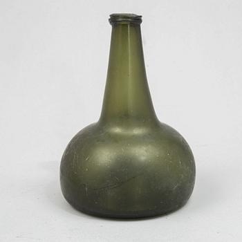 A glass bottle, 18th century.