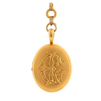 A gold locket with chain.