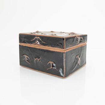 A glazed stone ware box.