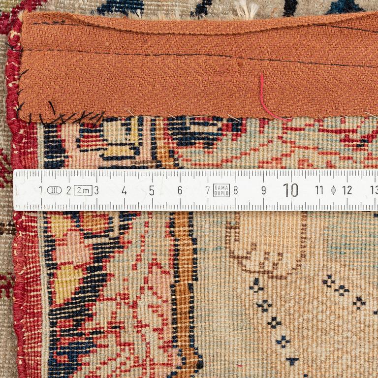 An antique pictoral Kerman Laver rug, south east Persia (Iran) c. 212 x 138 cm.