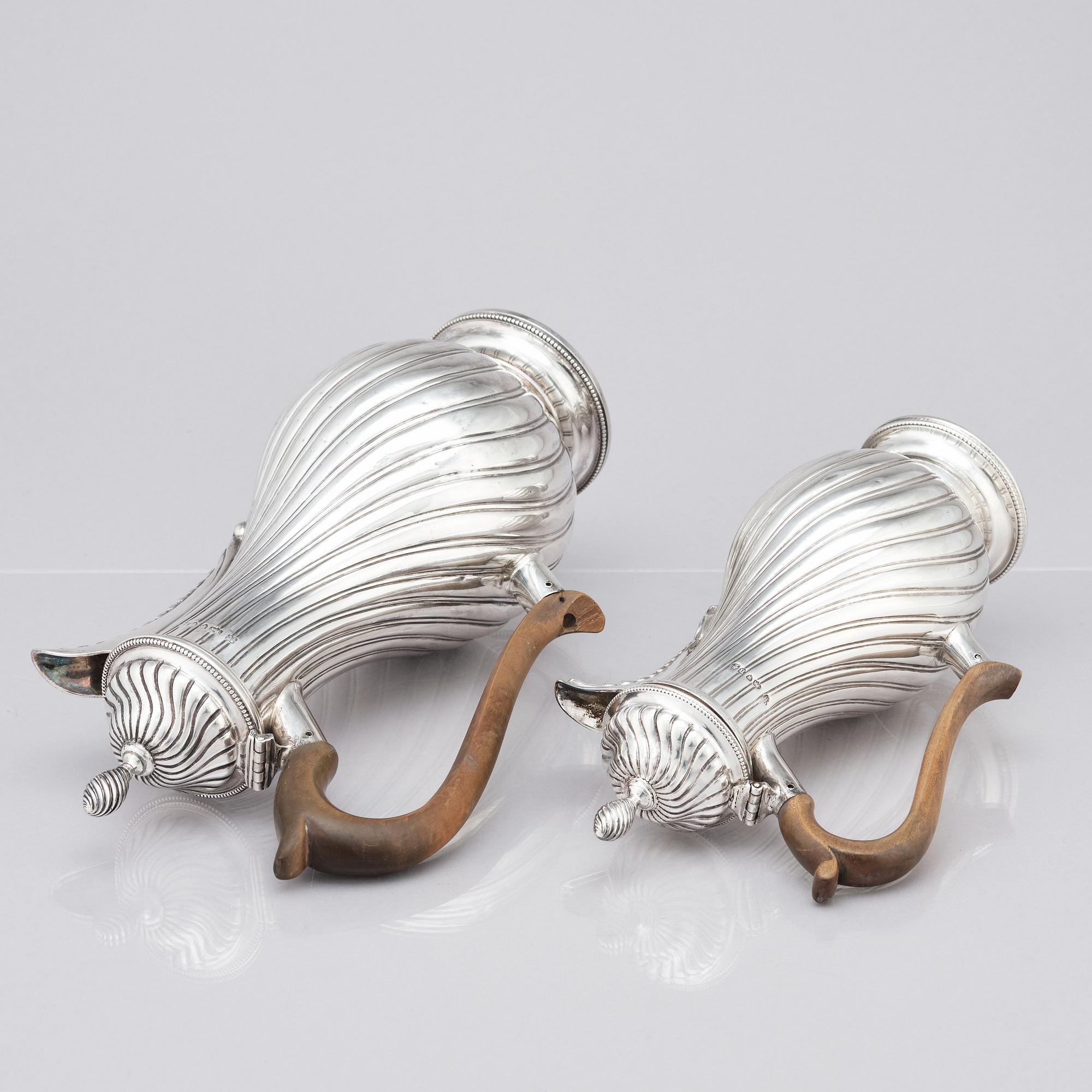 A Victorian silver coffee pot and a milk pot, Martin Hall & Co Ltd, London 1878 and Charles Stuart Harris, London 1877.
