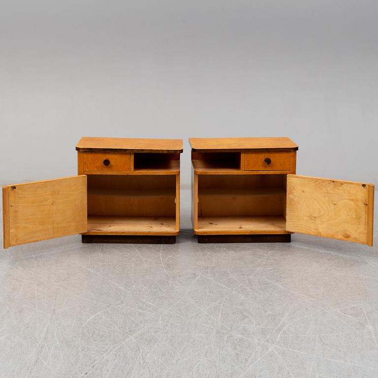 A pair of 1930/40's bedside tables.