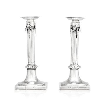 A pair of German 18th century silver candlesticks, marks of Johann Philipp Heckenauer, Augsburg 1787-1789.