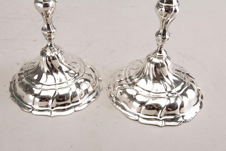 A pair of German silver candle sticks around 1900 total weight 374 gr.