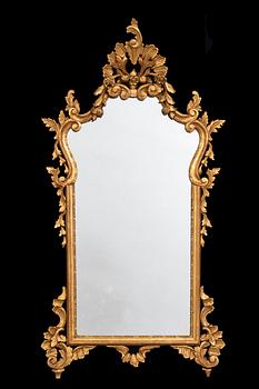 An mid 20th century Louis XV-style mirror from Paoletti, Firenze Italy.