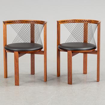 a pair of mahogany armchairs designed by Niels Jörgen Haugesen, made by Tranekaer Furniture, Denmark. 1995.