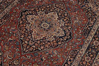 An oriental rug, c. 180 x 140 cm.