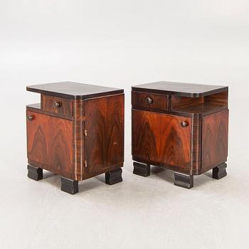 A pair of Art Deco 1940s walnut bedside talbes.
