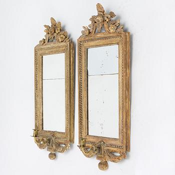A pair of gustavian one-light girandole mirrors, late 18th century.
