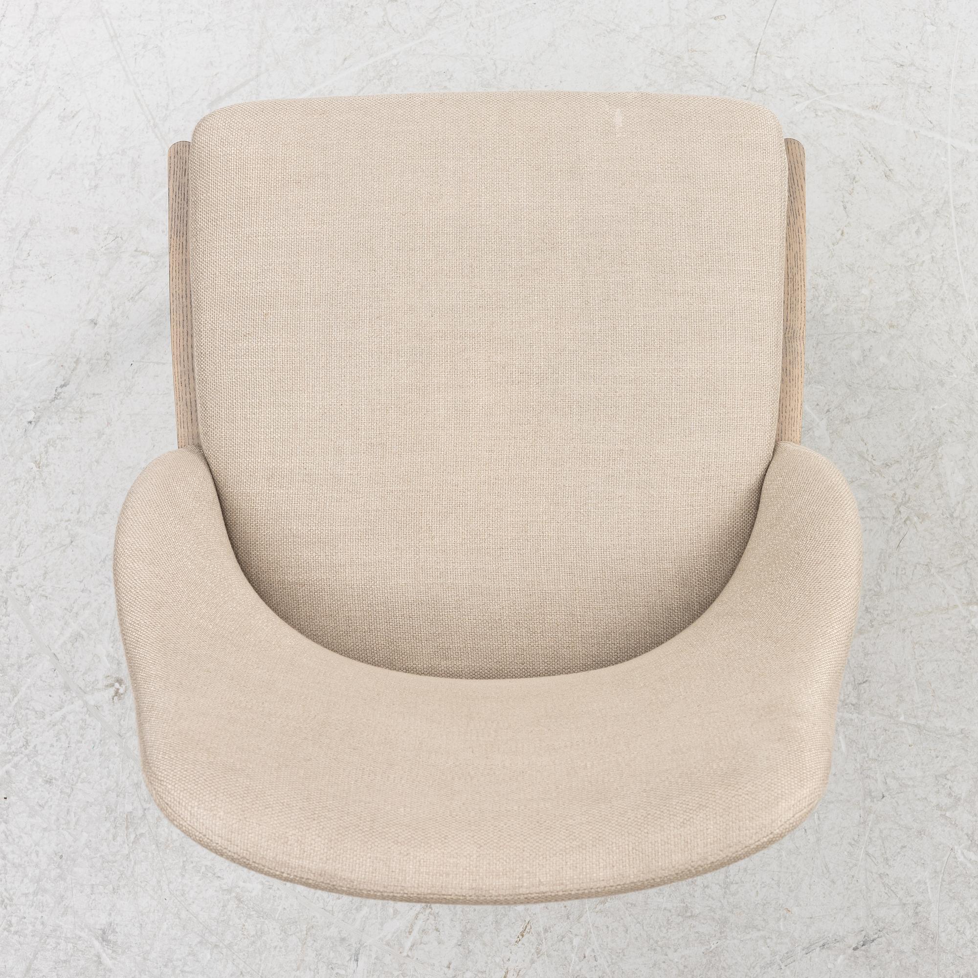 Rodolfo Dordoni, five armchairs and three chairs. 'Chelsea' chairs, Molteni.