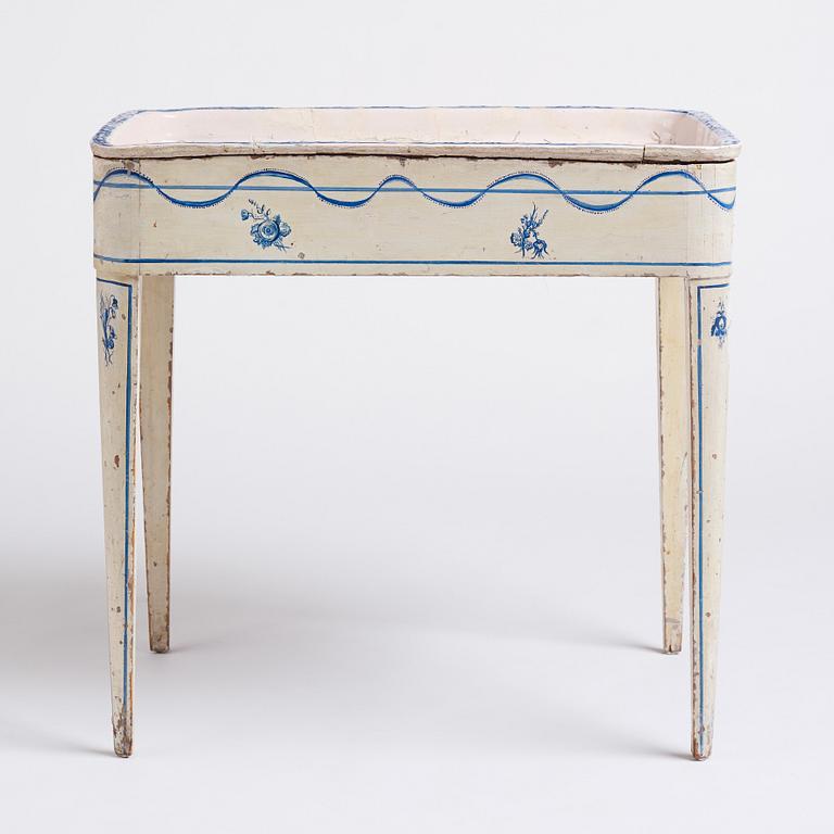 A blue and white faience tea table, second part of the 18th century.