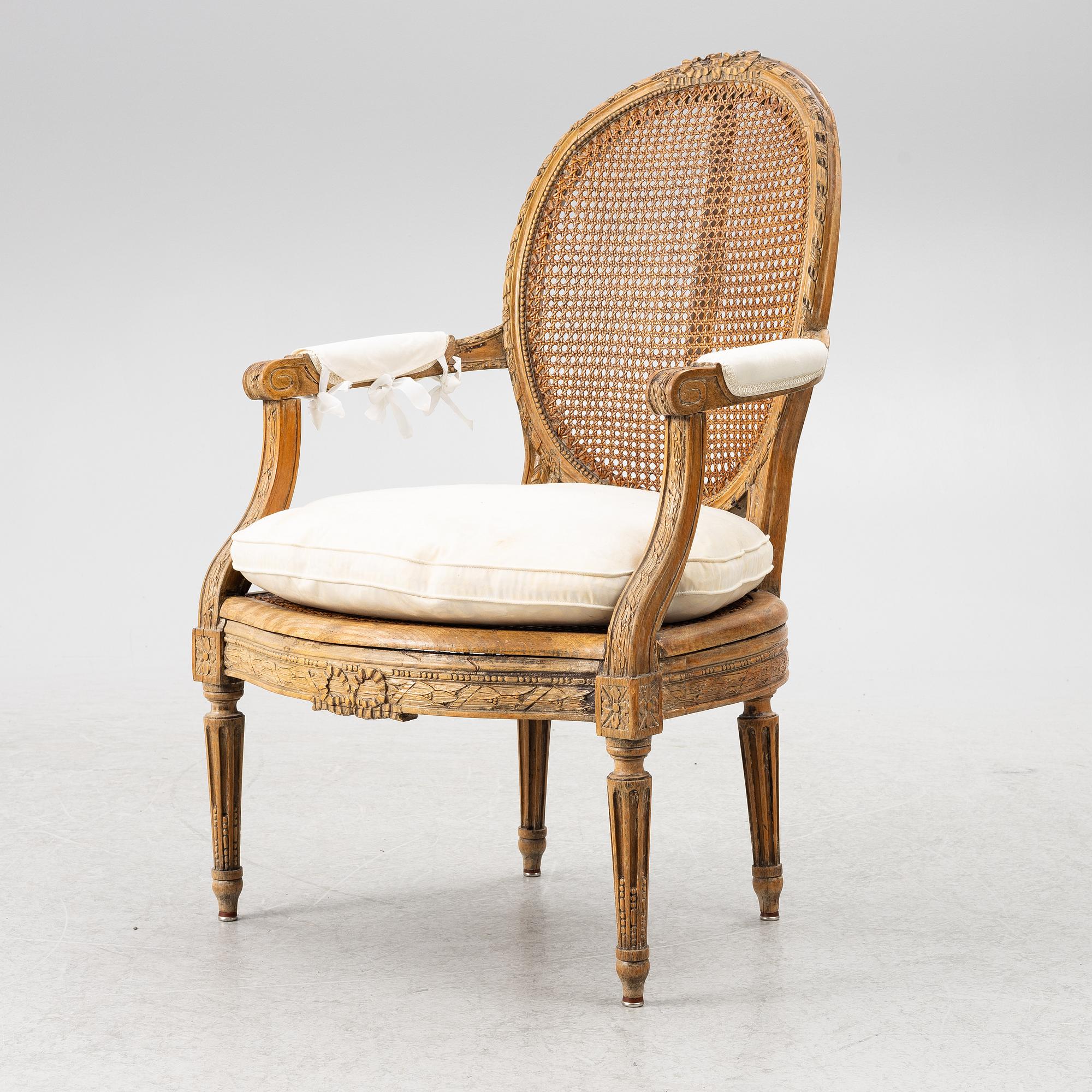 A Louis XVI-style armchair, 19th century.