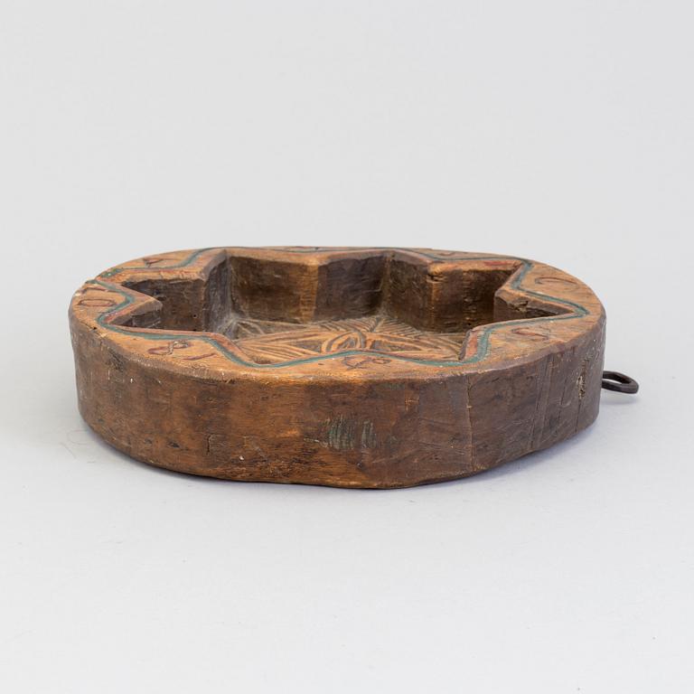 A swedish cheese mould, dated 1807.