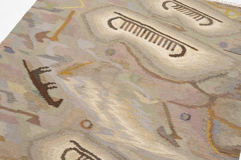 Edvin & Magnhild Lundsten, a carpet, 'Hällristningar' ('Petroglyph'), flat weave, c. 280 x 192 signed EML.