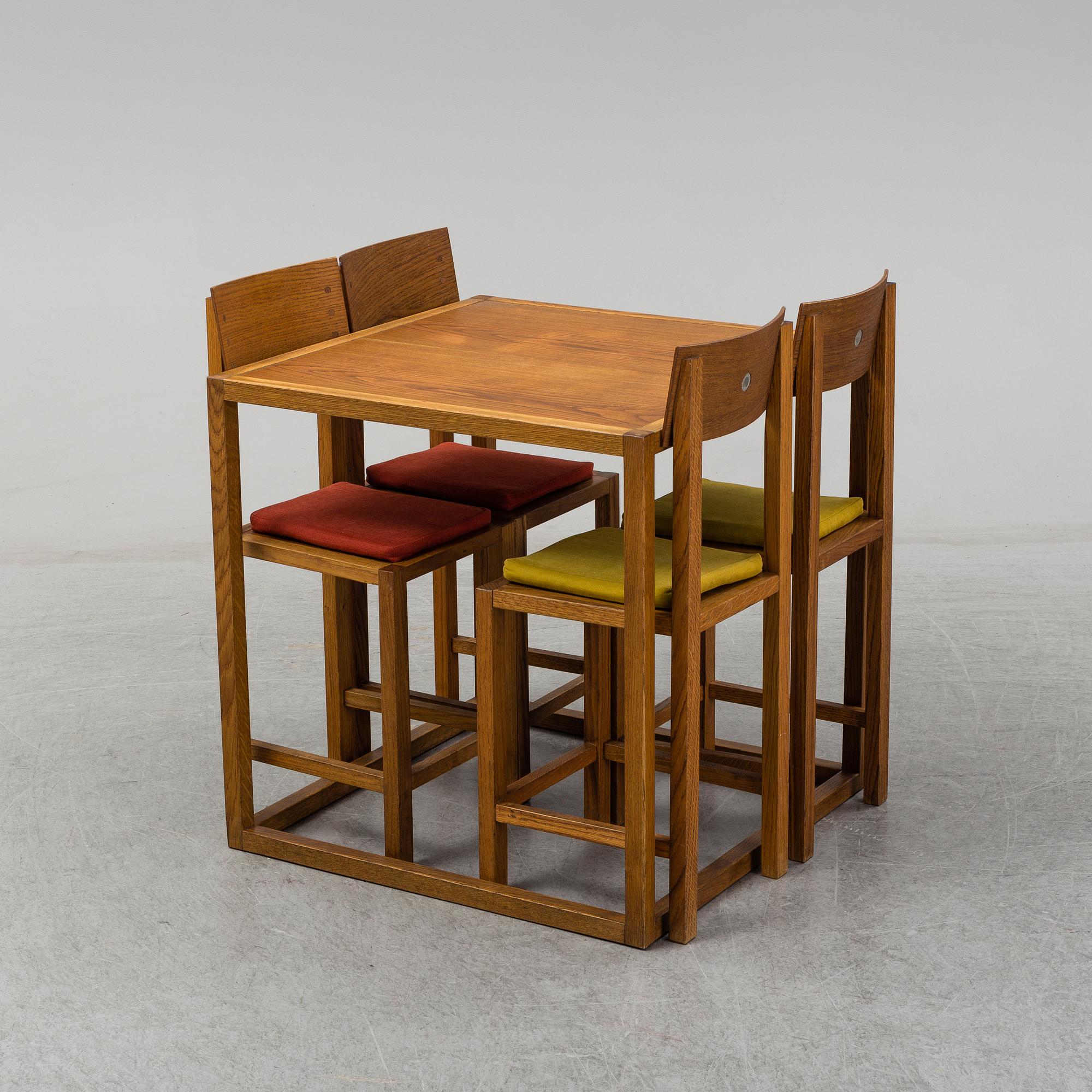MARIO PRANDINA, an oak table and four chairs, Plinio Il Giovane, Italy.