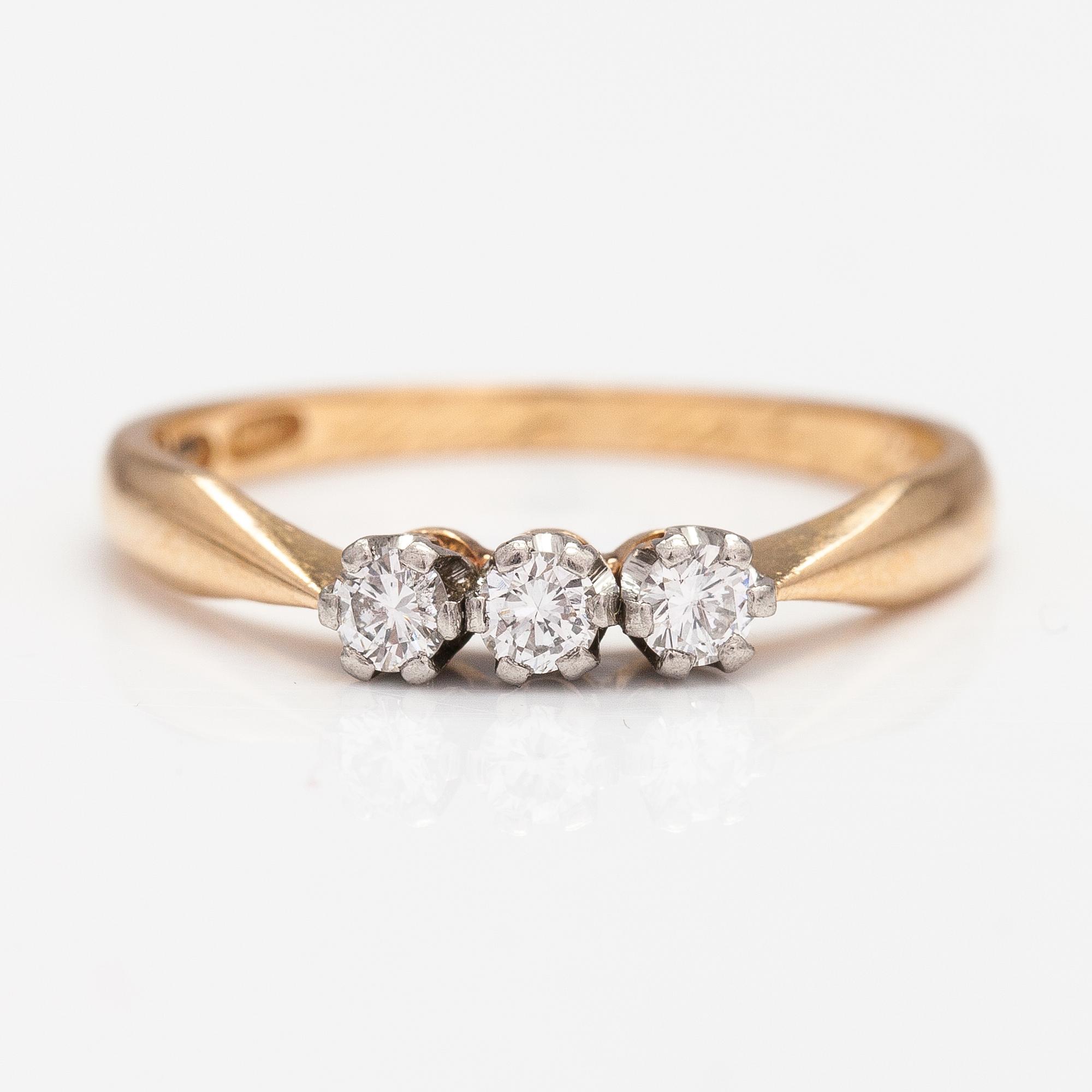 An 18K gold ring with diamonds ca. 0.24 ct in total. Westerback, Helsinki 1966.