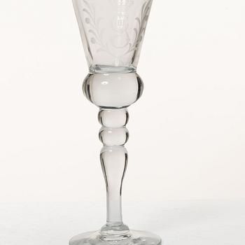 A set of 12 schnaps glasses by Reijmyre Glassworks with king Gustav III emblem.