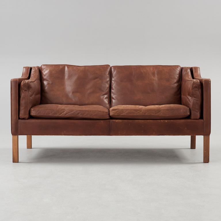 A Børge Mogensen two-seated dark brown leather sofa, Fredericia Stolefabrik, Denmark.