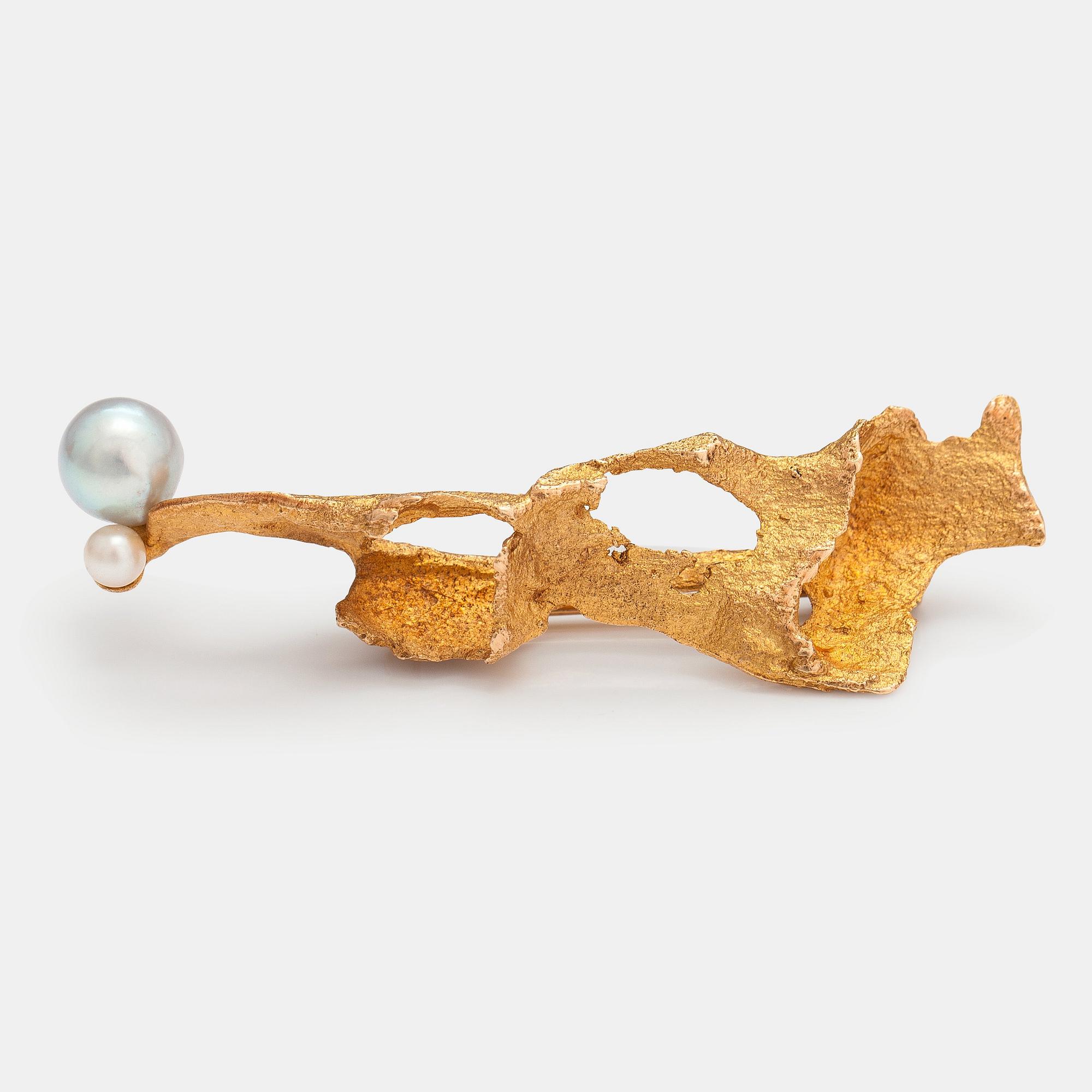 Björn Weckström, A 14K gold brooch "The magic of happiness" with cultured pearls. Lapponia 1968.