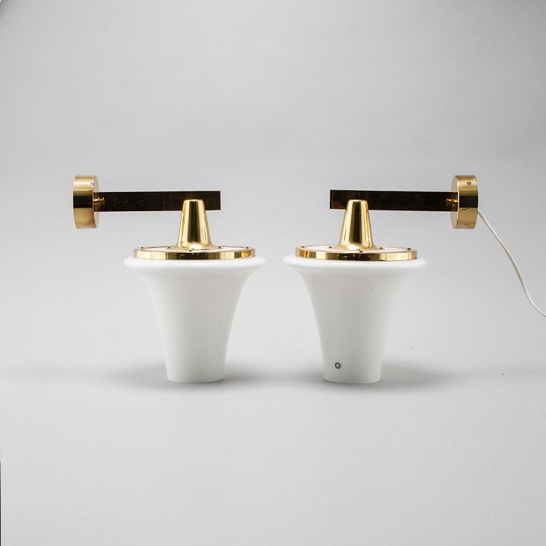 A pair of wall lamps designed by Hans-Agne Jakobsson, Markaryd, from the fourth quarter of the 20th century.