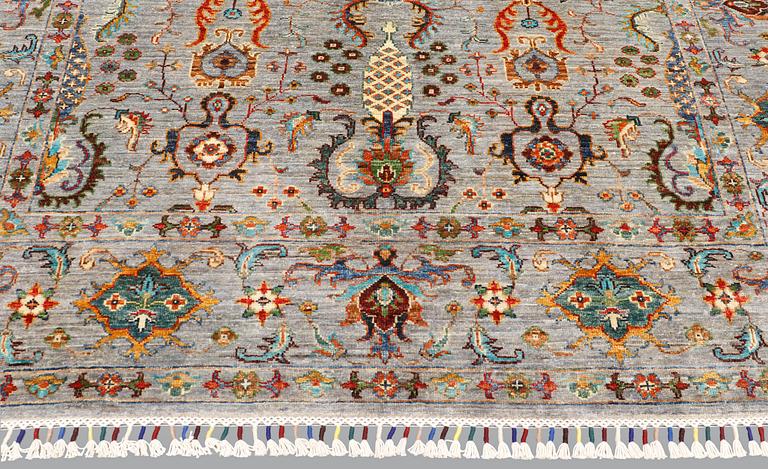A rug, Ziegler design, approx. 240 x 172 cm.