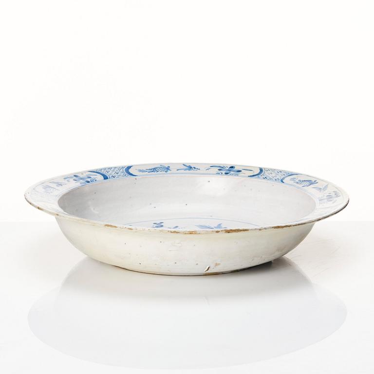 A large Swedish Rörstrand basin/deep dish, dated 28/5 1753.