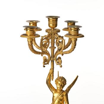 A pair of Empire five lights candelabra.