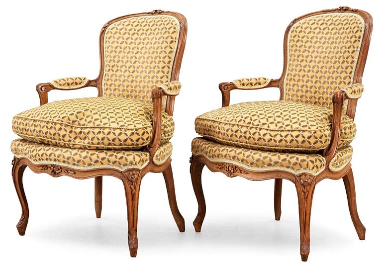 A pair of Louis XV 18th century armchairs.