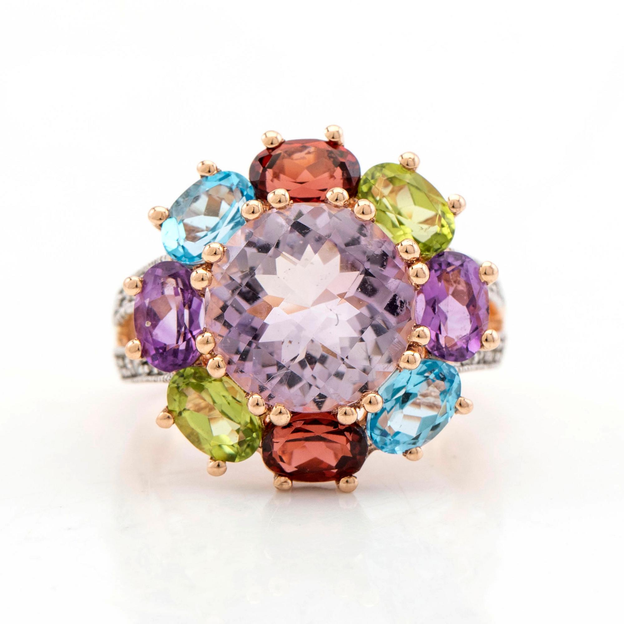 Cocktail ring, 14K gold with various gemstones, including garnet and peridot as well as brilliant-cut diamonds.