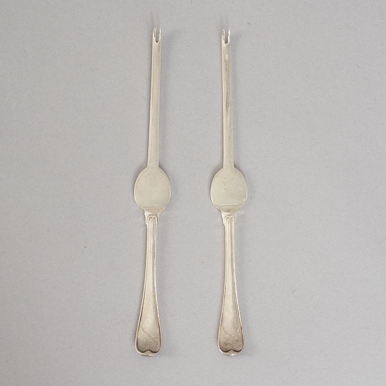 A set of ten French 19th century silver lobster-cutery.