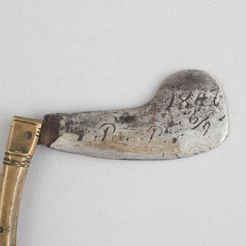 A feast knife, dated 1842.