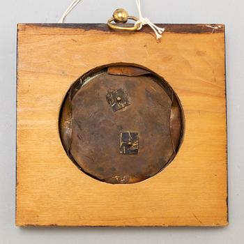 A Swedish Empire copper and gilt bronze portrait medallion representing Johan Tobias Sergel.