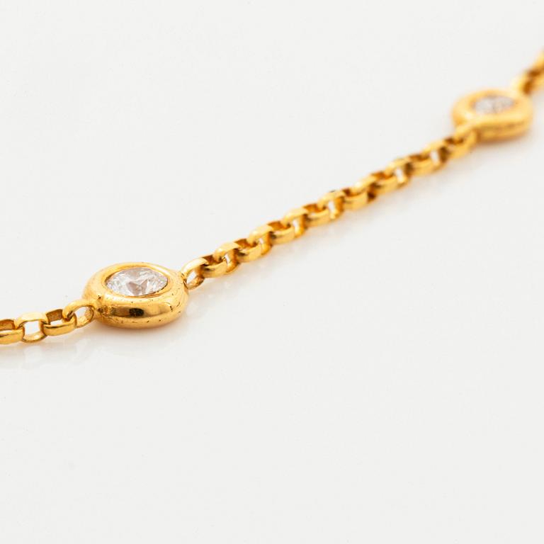 Collier 18K guld med runda briljantslipade diamanter.