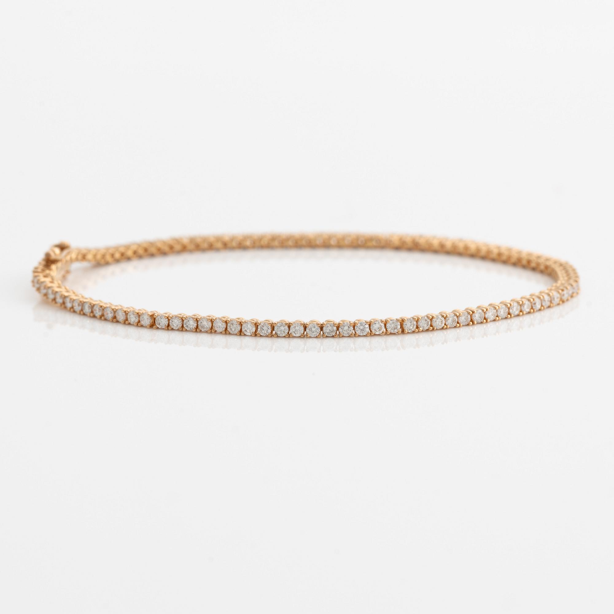 Tennisarmband 14K guld med runda briljantslipade diamanter.