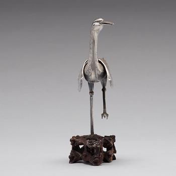 A silver crane, late Qing dynasty.