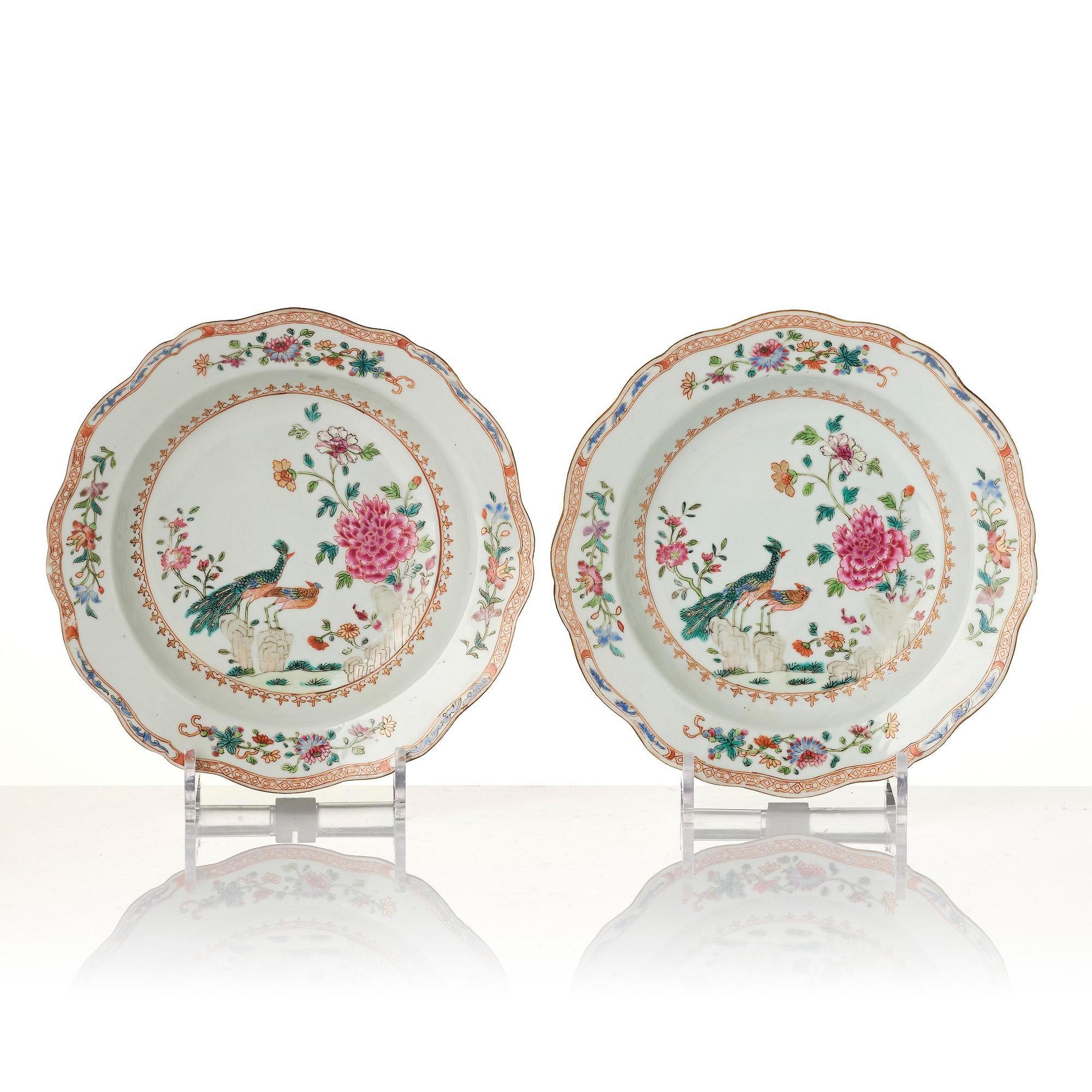 A group of famille rose 'double peacock' serving dishes, Qing dynasty, Qianlong (1736-95). (8 pieces).