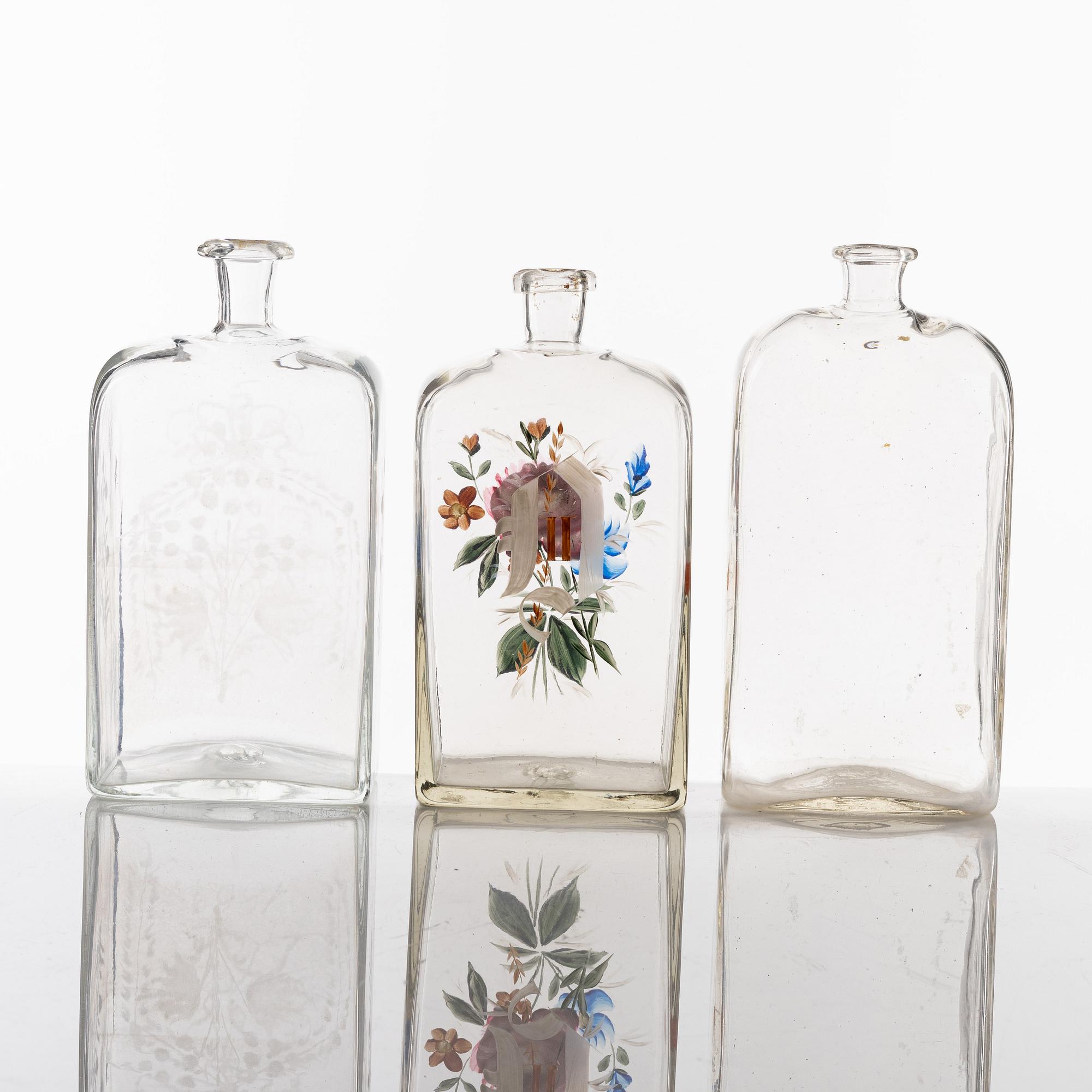 A set of seven glass bottles, 19th Century/circa 1900.