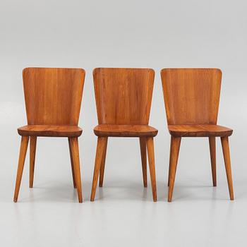 Göran Malmvall, a pine dining table and three chairs, mid 20th century.