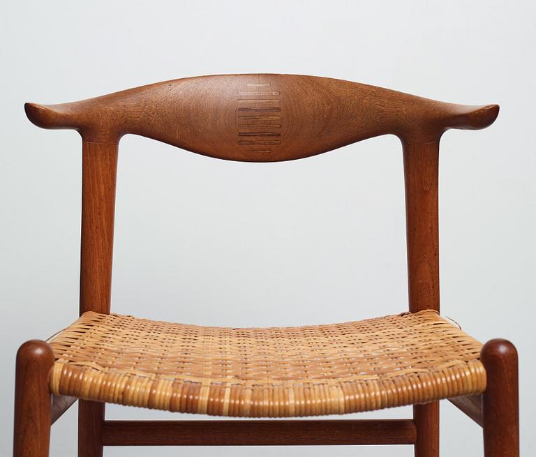 Hans J. Wegner, a set of six teak and rattan "Cowhorn Chairs" "JH-505", executed by cabinetmaker Johannes Hansen, Denmark 1950-60's.